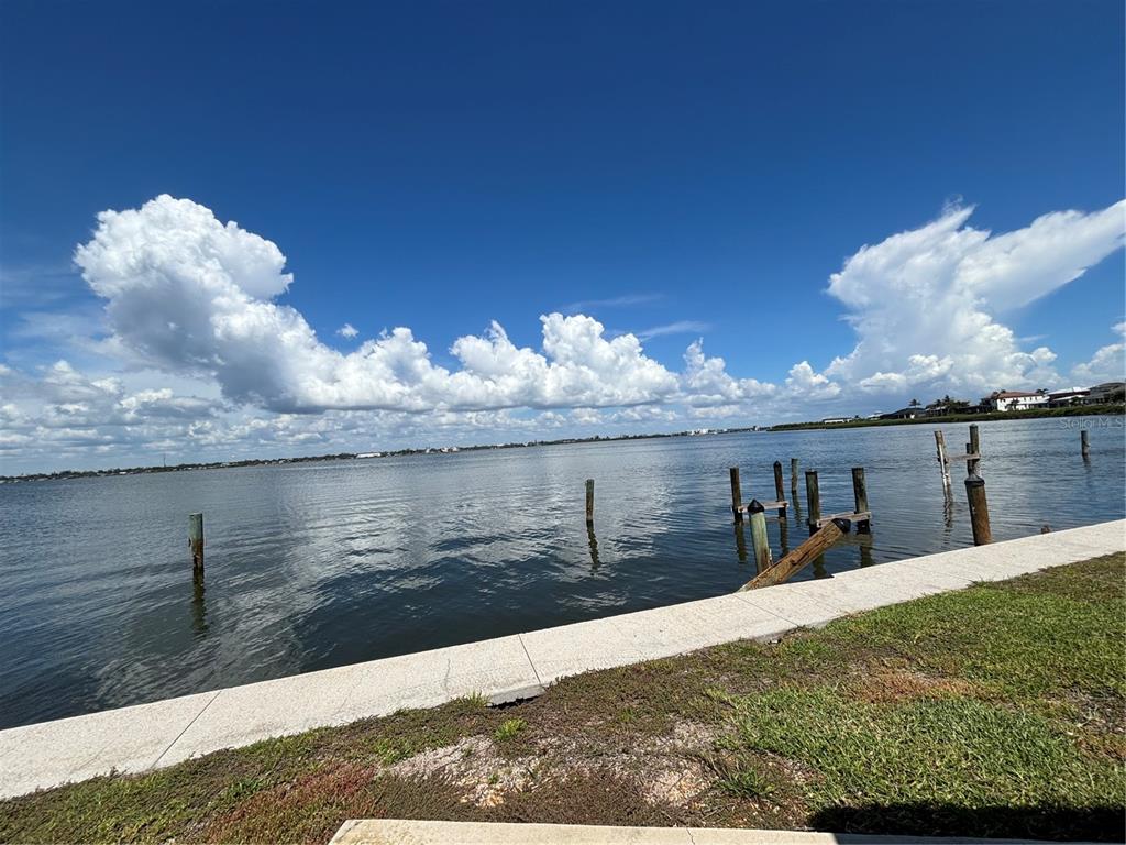2985 North Beach Road, Unit C71 Englewood, FL 34223 - Photo 3 of 23 a view of a lake from a balcony