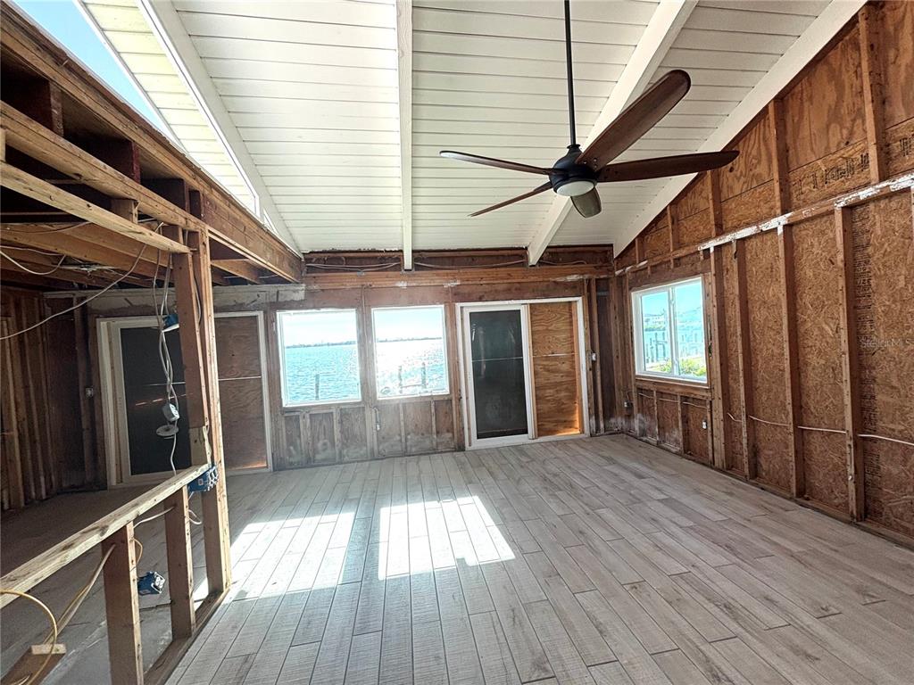 2985 North Beach Road, Unit C71 Englewood, FL 34223 - Photo 6 of 23 a view of outdoor space with wooden floor and windows