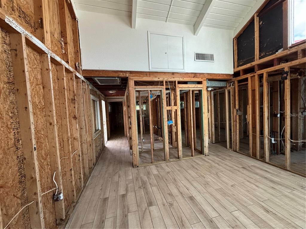 2985 North Beach Road, Unit C71 Englewood, FL 34223 - Photo 9 of 23 a view of a house with wooden floor