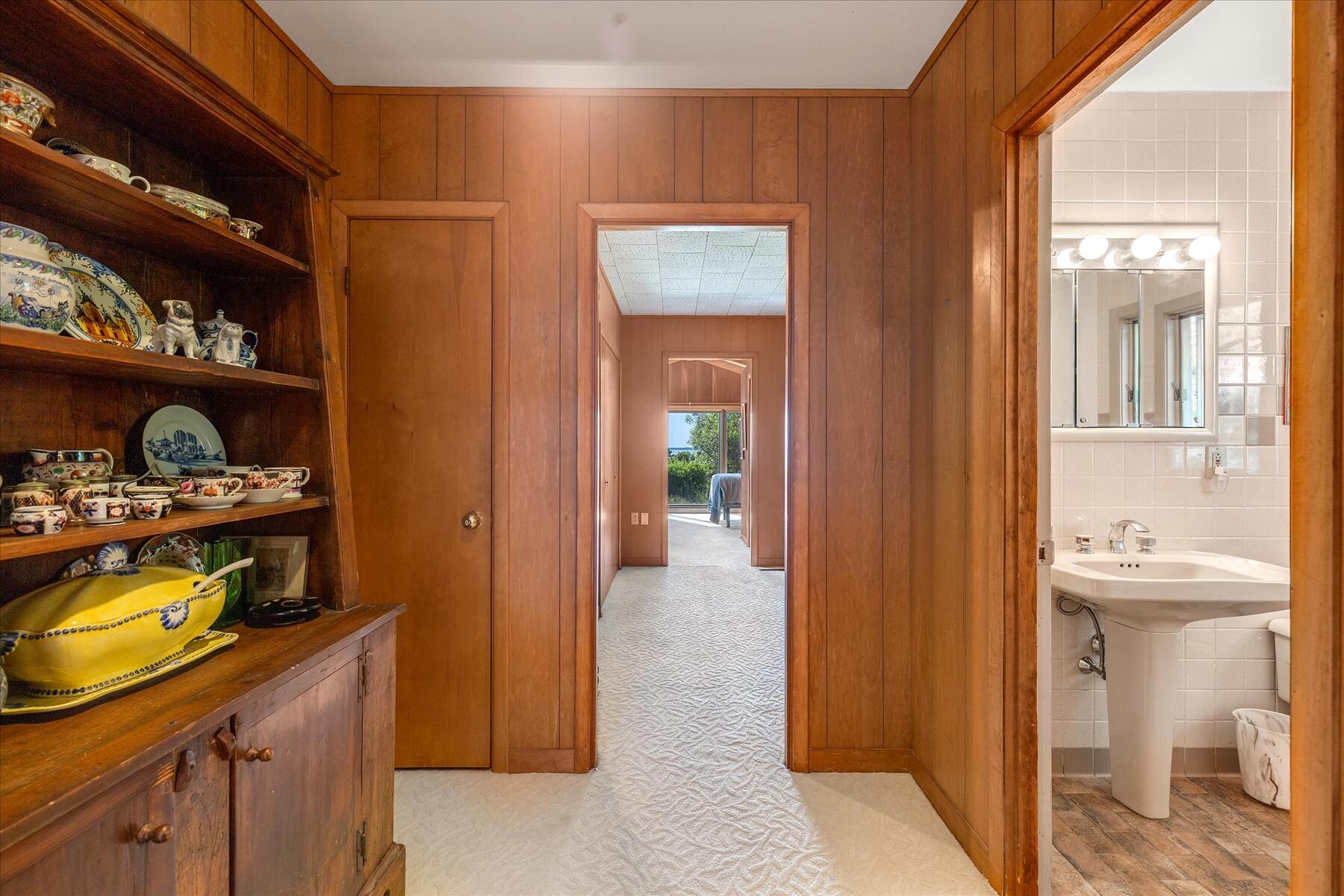 31 Bay View Road Truro, MA 02666 - Photo 14 of 54 a bathroom with a sink a toilet and shower curtain