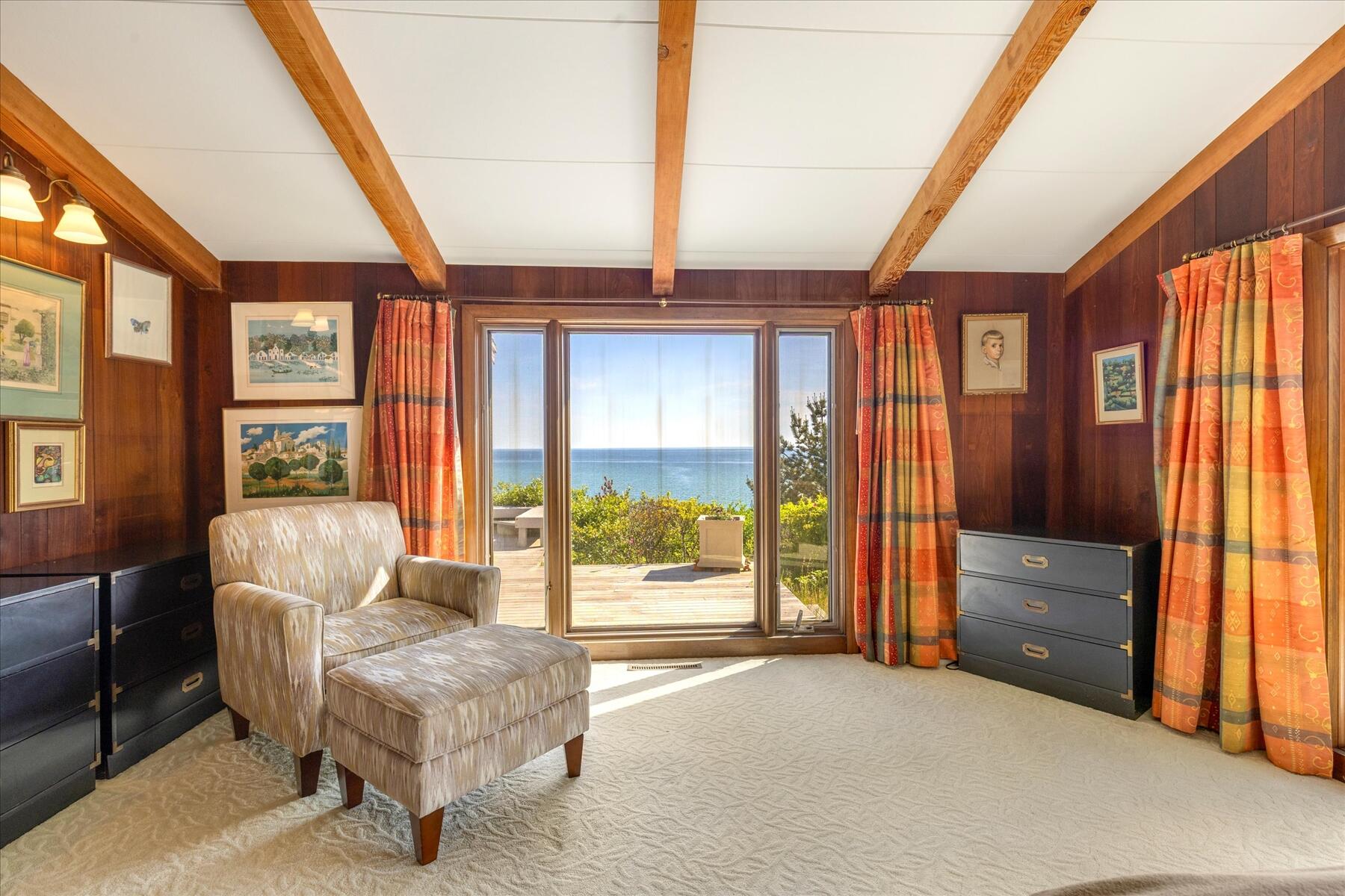 31 Bay View Road Truro, MA 02666 - Photo 17 of 54 a living room with furniture and large windows
