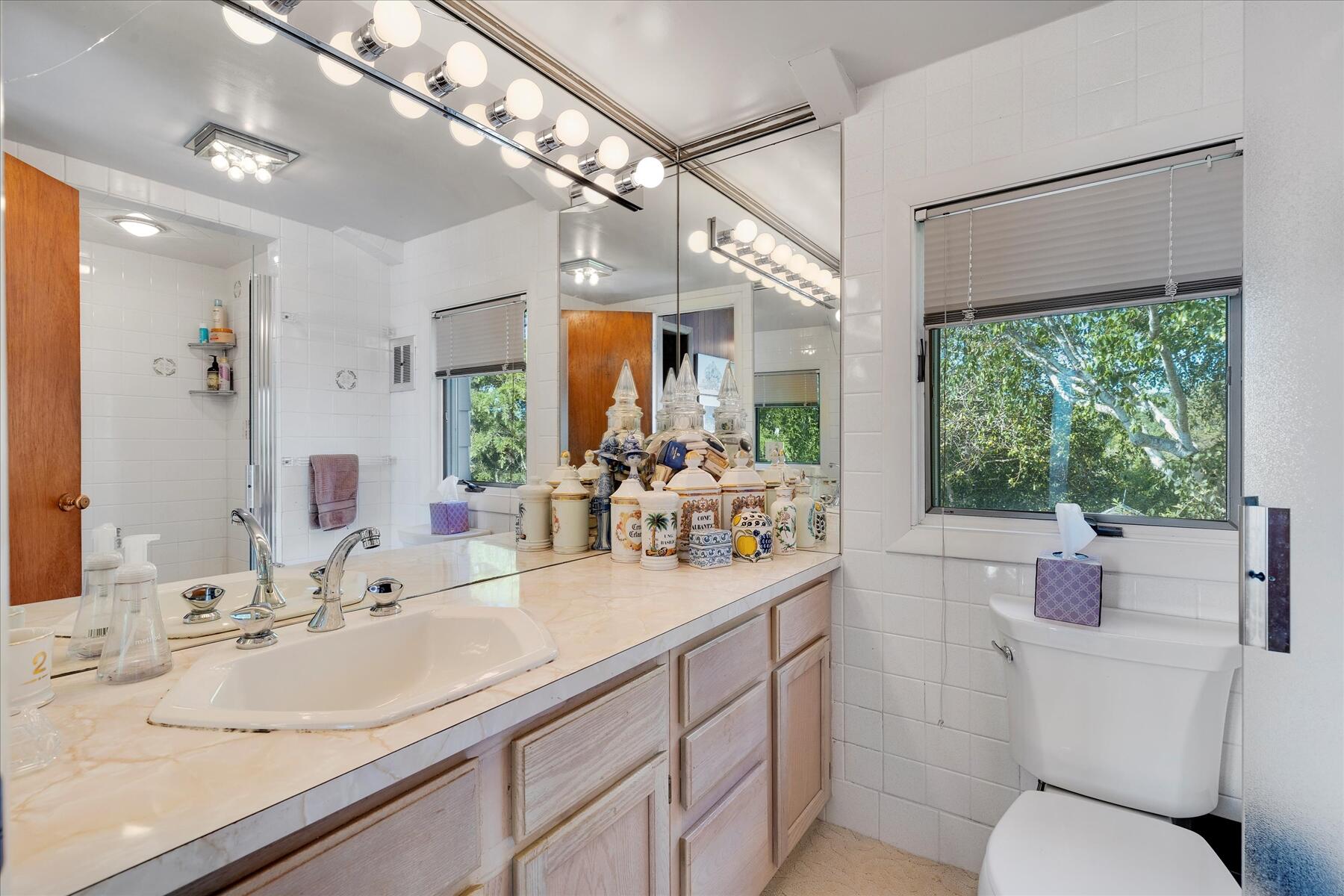 31 Bay View Road Truro, MA 02666 - Photo 19 of 54 a bathroom with a double vanity sink toilet and shower
