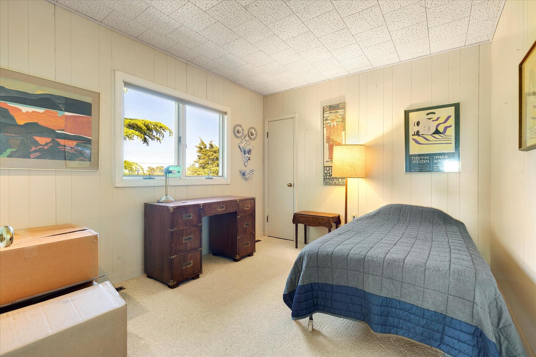 31 Bay View Road Truro, MA 02666 - Photo 20 of 54 a bedroom with a bed and a dresser
