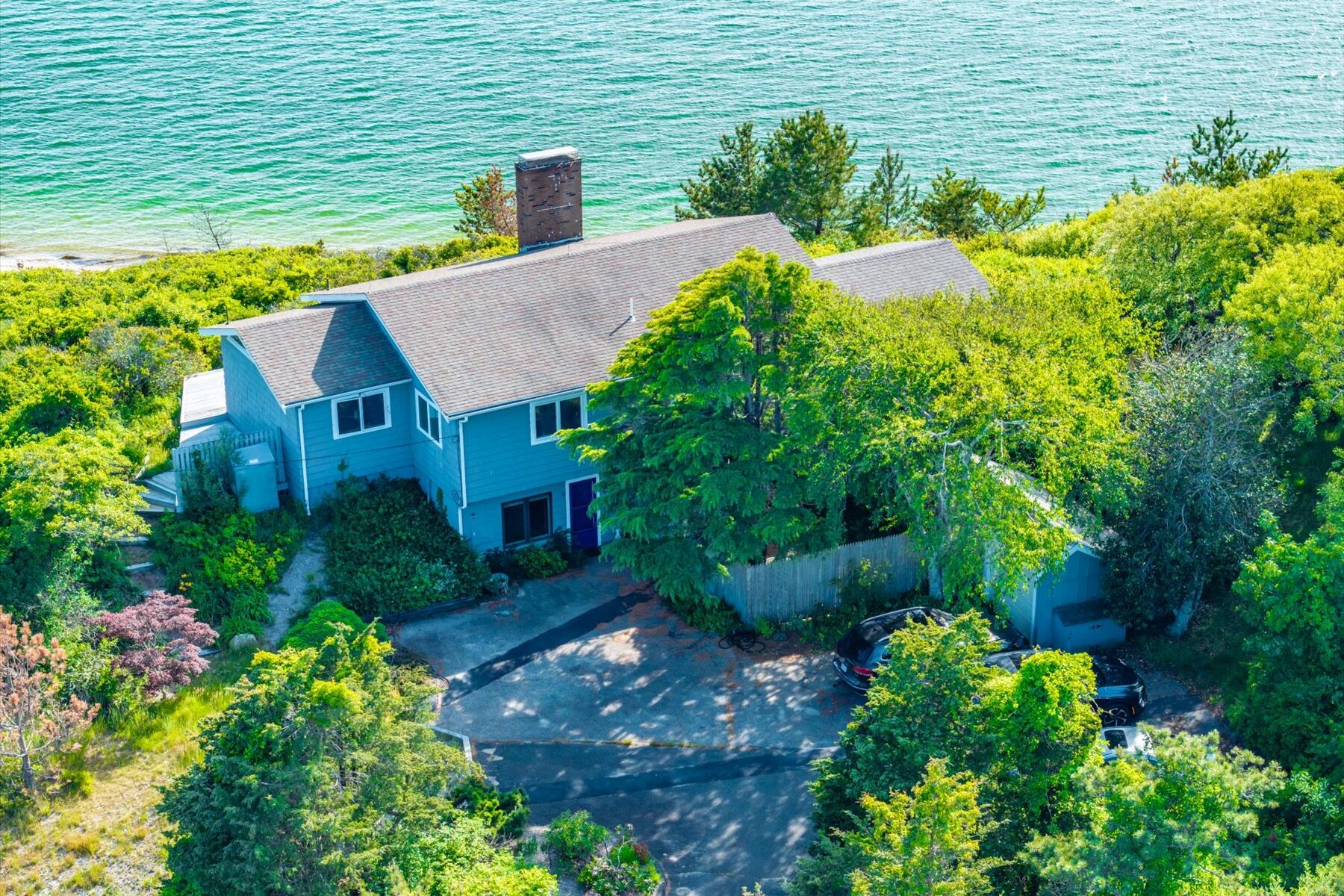 31 Bay View Road Truro, MA 02666 - Photo 2 of 54 a aerial view of a house with a yard and potted plants