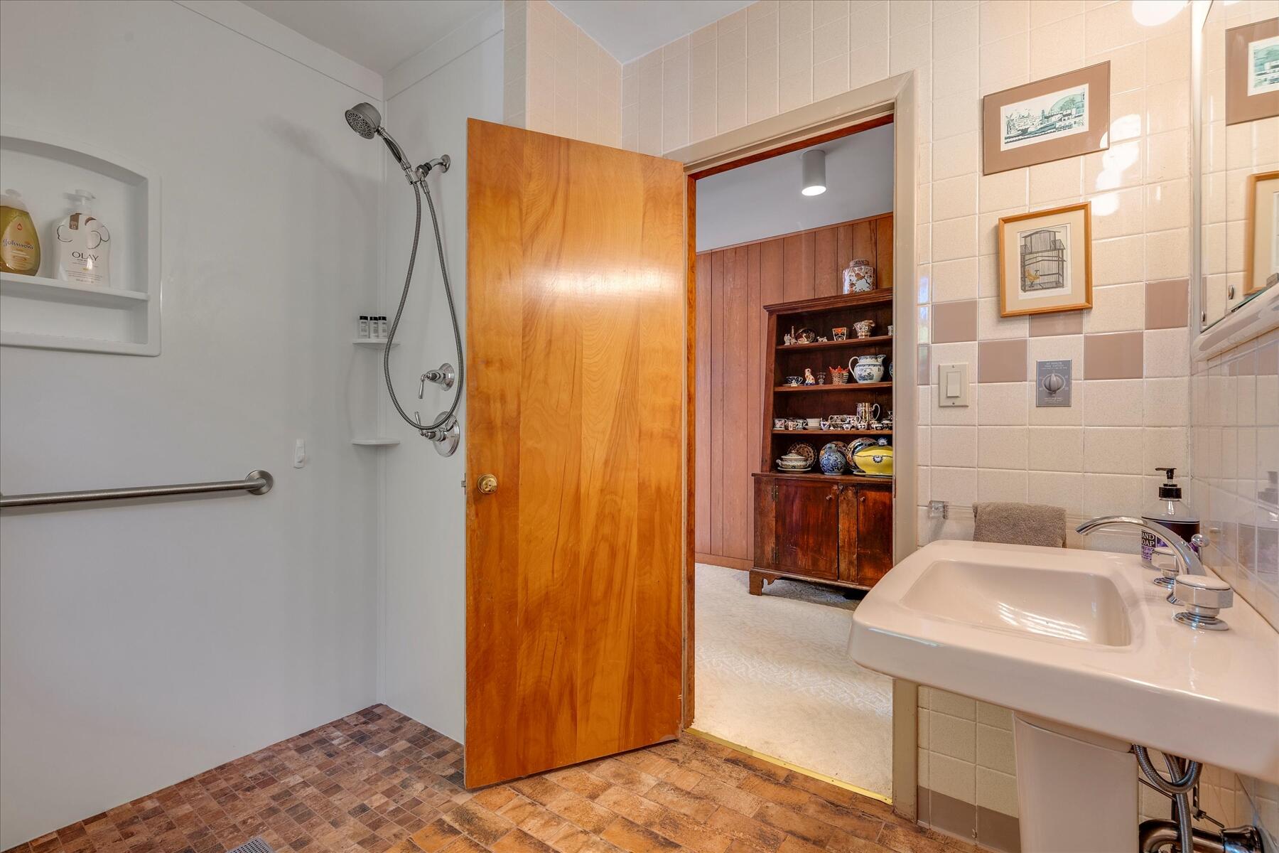 31 Bay View Road Truro, MA 02666 - Photo 21 of 54 a bathroom with a sink and a mirror