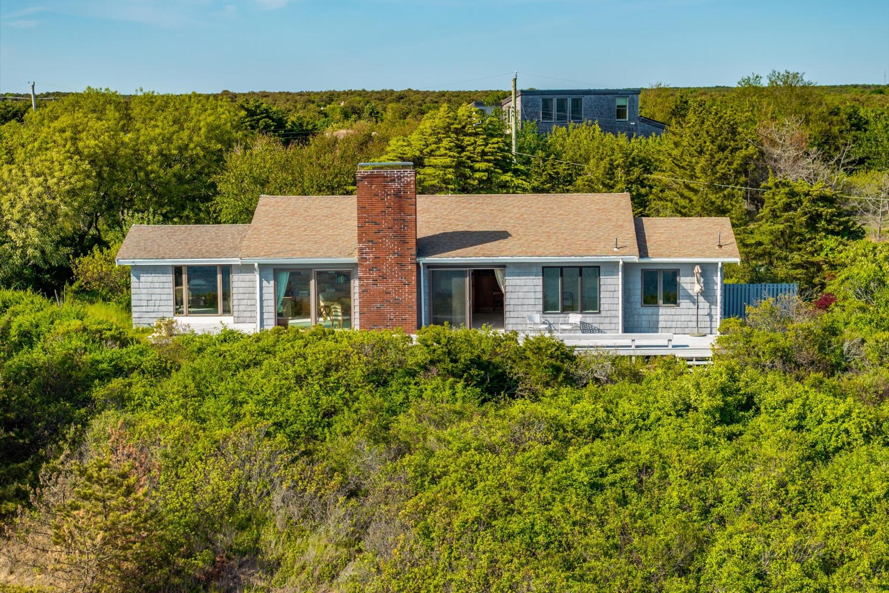 31 Bay View Road Truro, MA 02666 - Photo 38 of 54 front view of a house with a yard