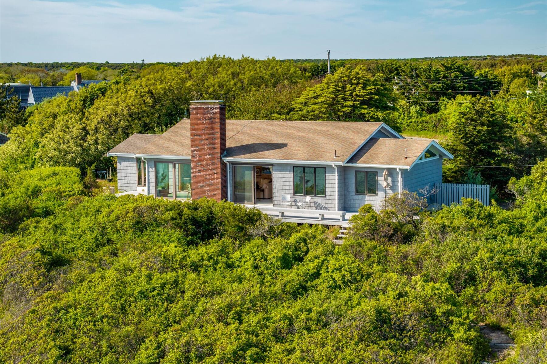 31 Bay View Road Truro, MA 02666 - Photo 5 of 54 front view of a house with a yard