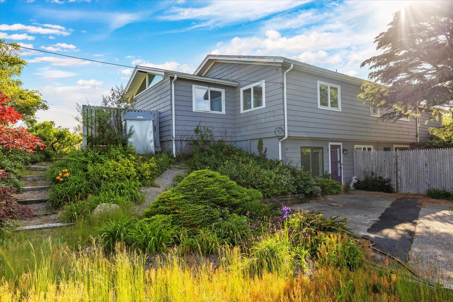 31 Bay View Road Truro, MA 02666 - Photo 51 of 54 a front view of a house with a yard