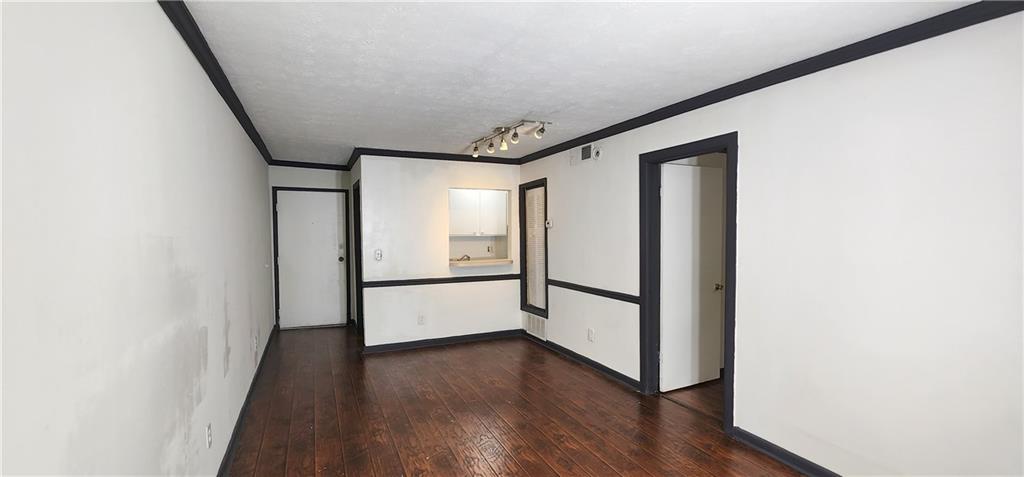 2805 Ne Expressway, Unit B36 Atlanta, GA 30345 - Photo 11 of 29 a view of a hallway with wooden floor