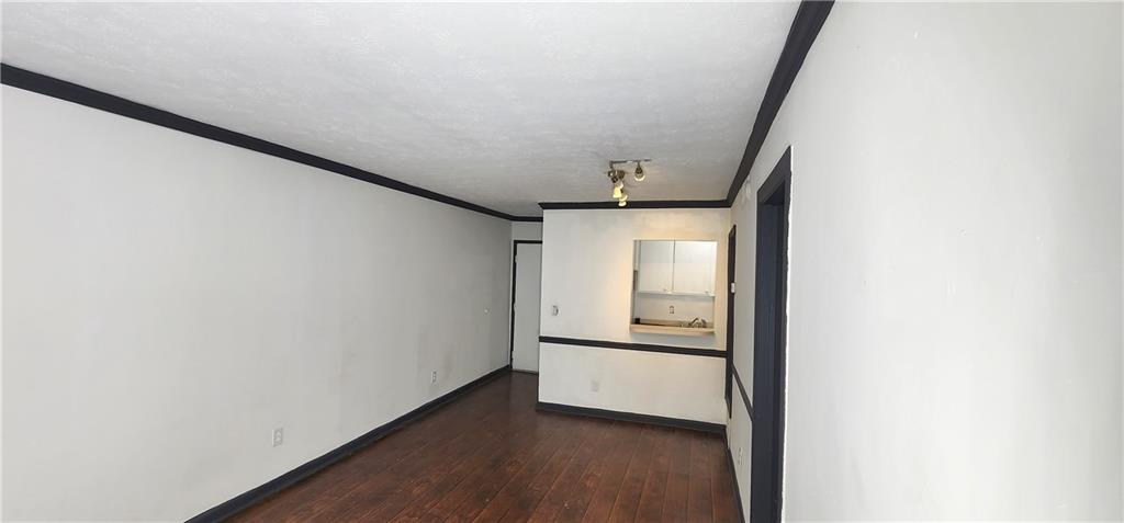 2805 Ne Expressway, Unit B36 Atlanta, GA 30345 - Photo 13 of 29 a view of a hallway with wooden floor
