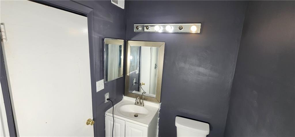 2805 Ne Expressway, Unit B36 Atlanta, GA 30345 - Photo 23 of 29 a bathroom with a toilet and a sink