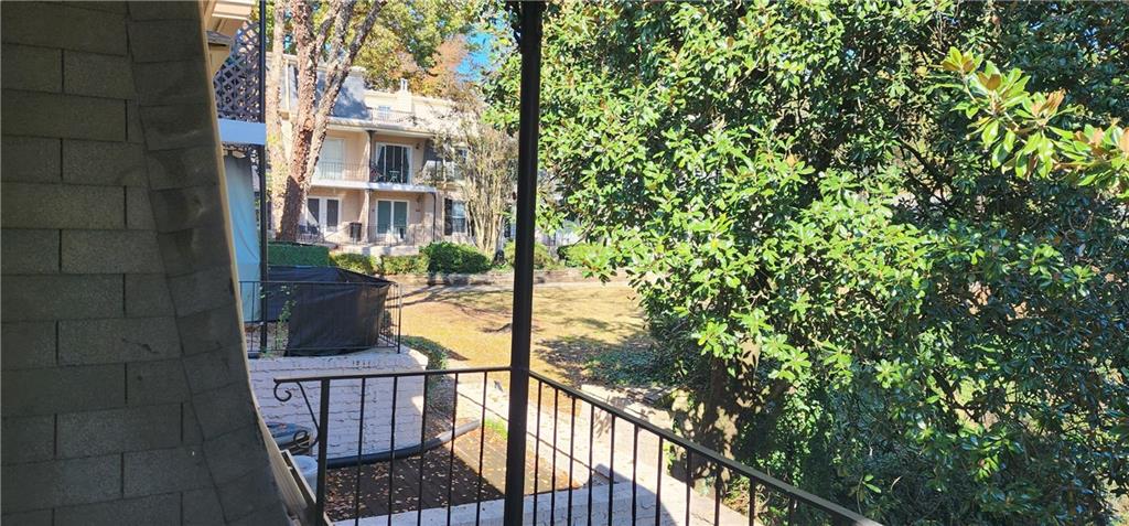 2805 Ne Expressway, Unit B36 Atlanta, GA 30345 - Photo 26 of 29 a view of a balcony with wooden floor