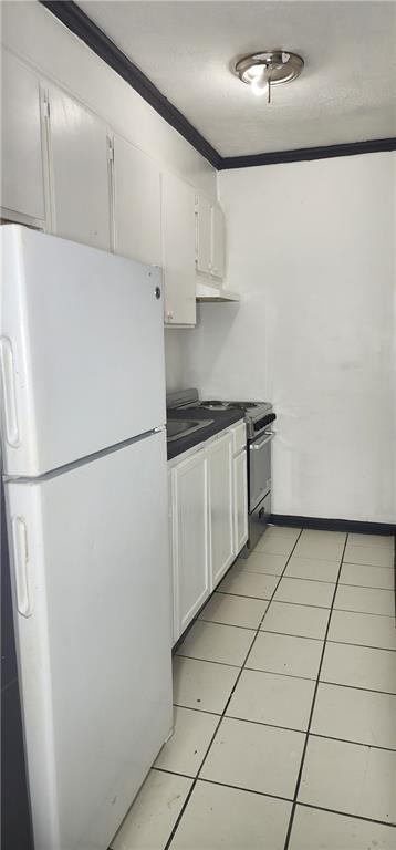 2805 Ne Expressway, Unit B36 Atlanta, GA 30345 - Photo 6 of 29 a kitchen with stainless steel appliances a refrigerator sink and cabinets