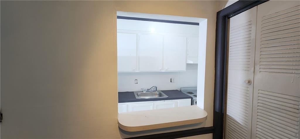 2805 Ne Expressway, Unit B36 Atlanta, GA 30345 - Photo 9 of 29 a bathroom with a sink and a mirror