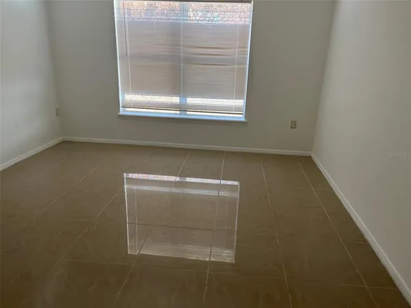 an empty room with a window
