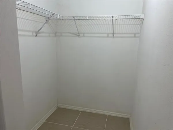 a view of a room with racks on the wall