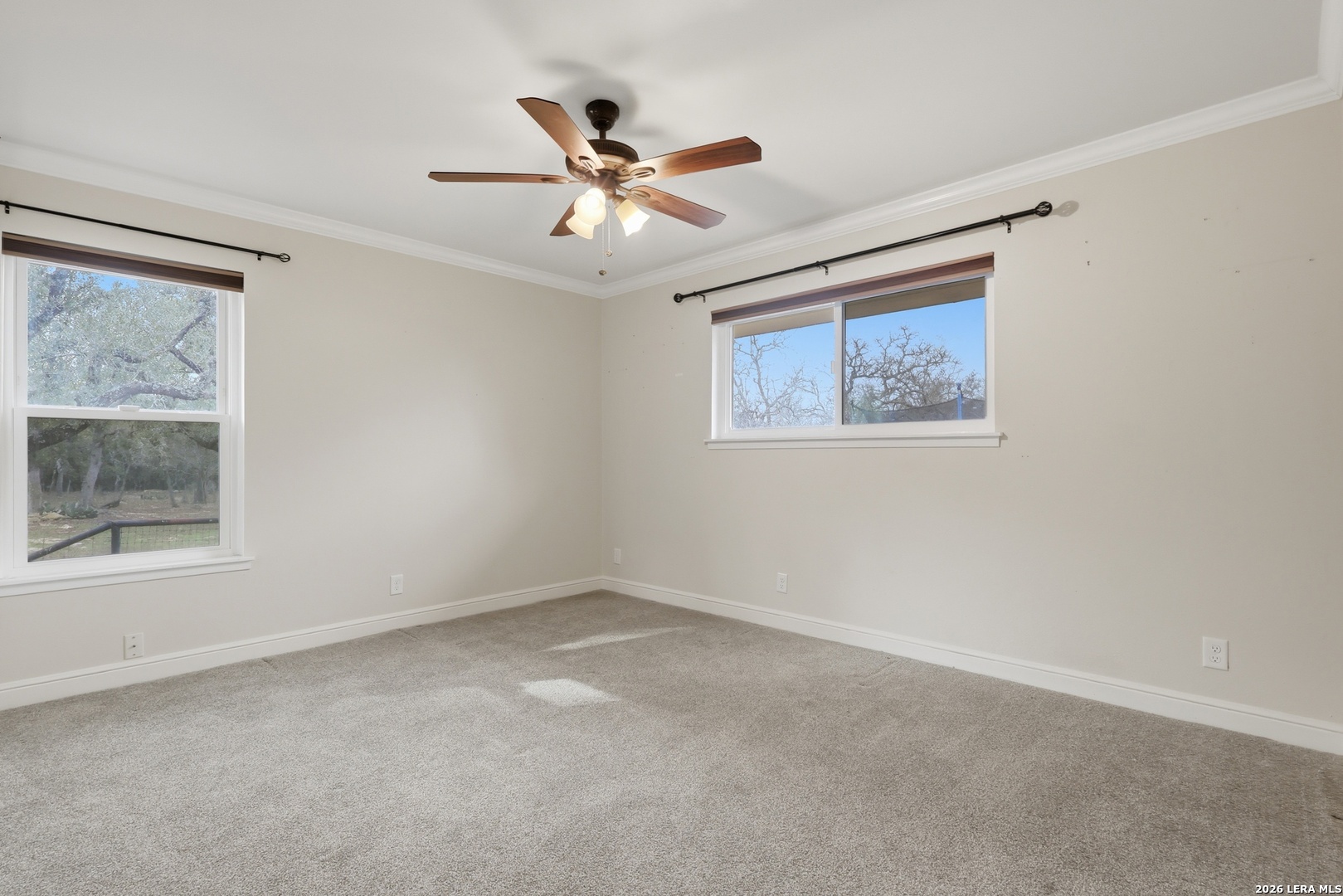 30511 Oakview Road Bulverde, TX 78163 - Photo 11 of 35 a view of an empty room with a window