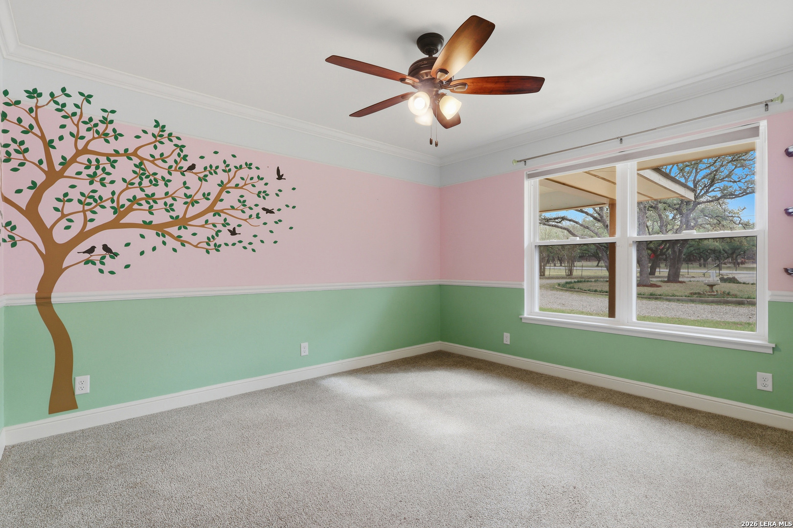 30511 Oakview Road Bulverde, TX 78163 - Photo 16 of 35 an empty room with window and ceiling fan
