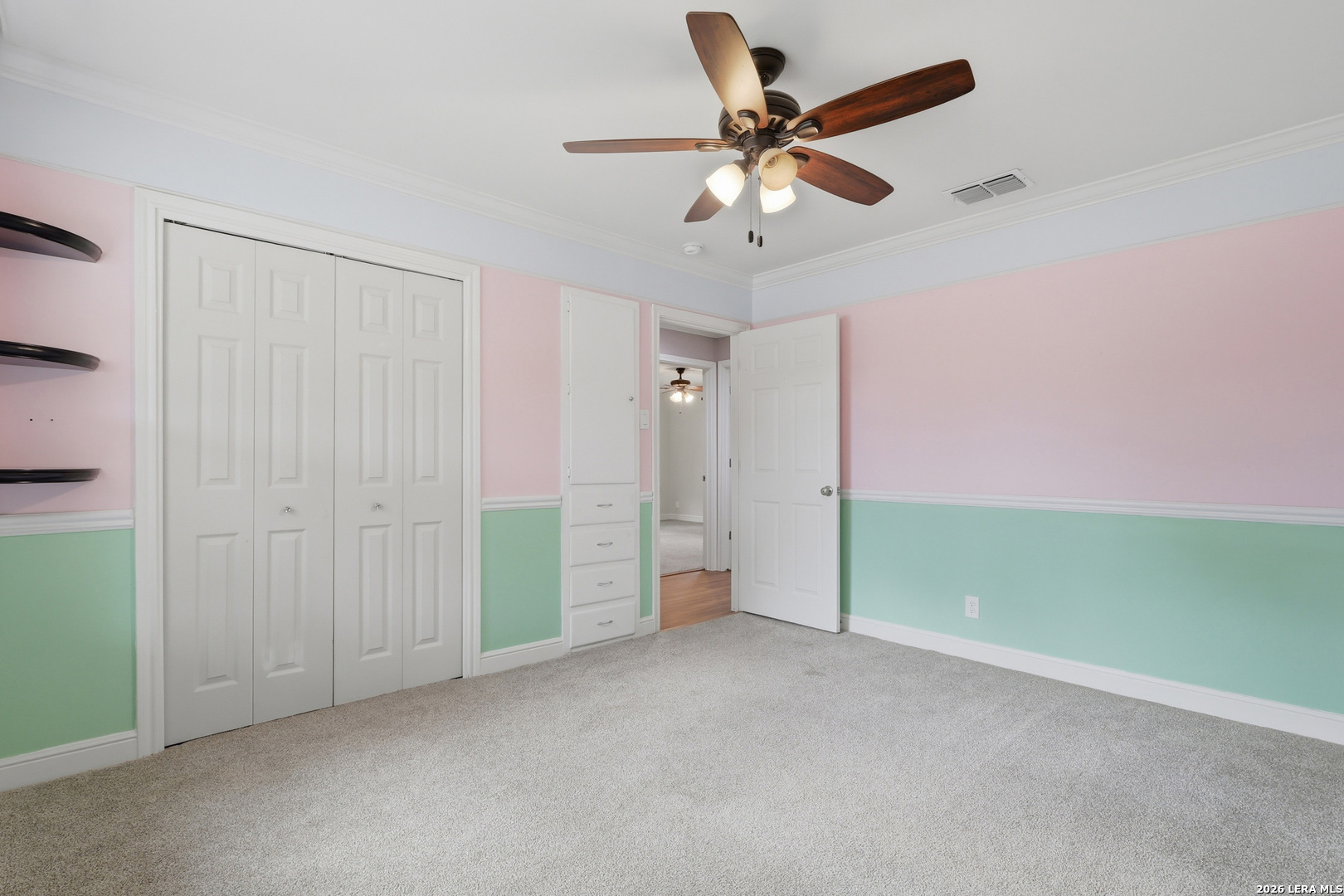 30511 Oakview Road Bulverde, TX 78163 - Photo 17 of 35 an empty room with closet and fan