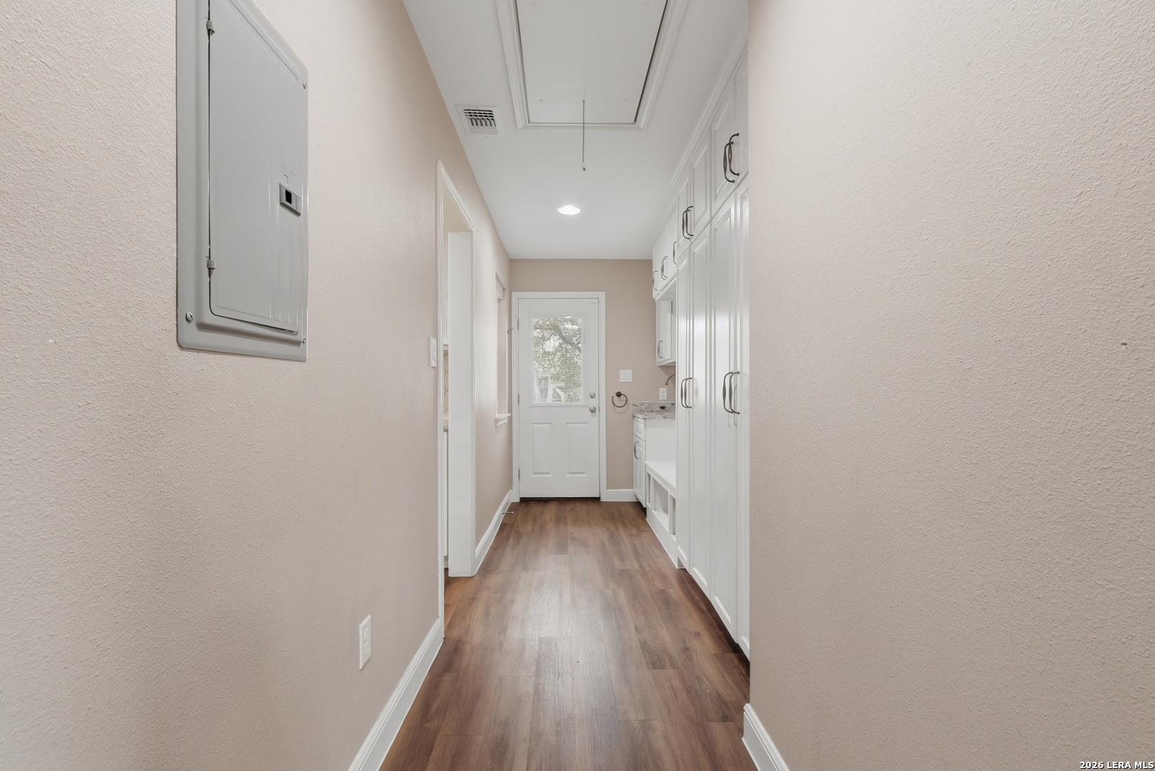 30511 Oakview Road Bulverde, TX 78163 - Photo 18 of 35 a view of a hallway with wooden floor
