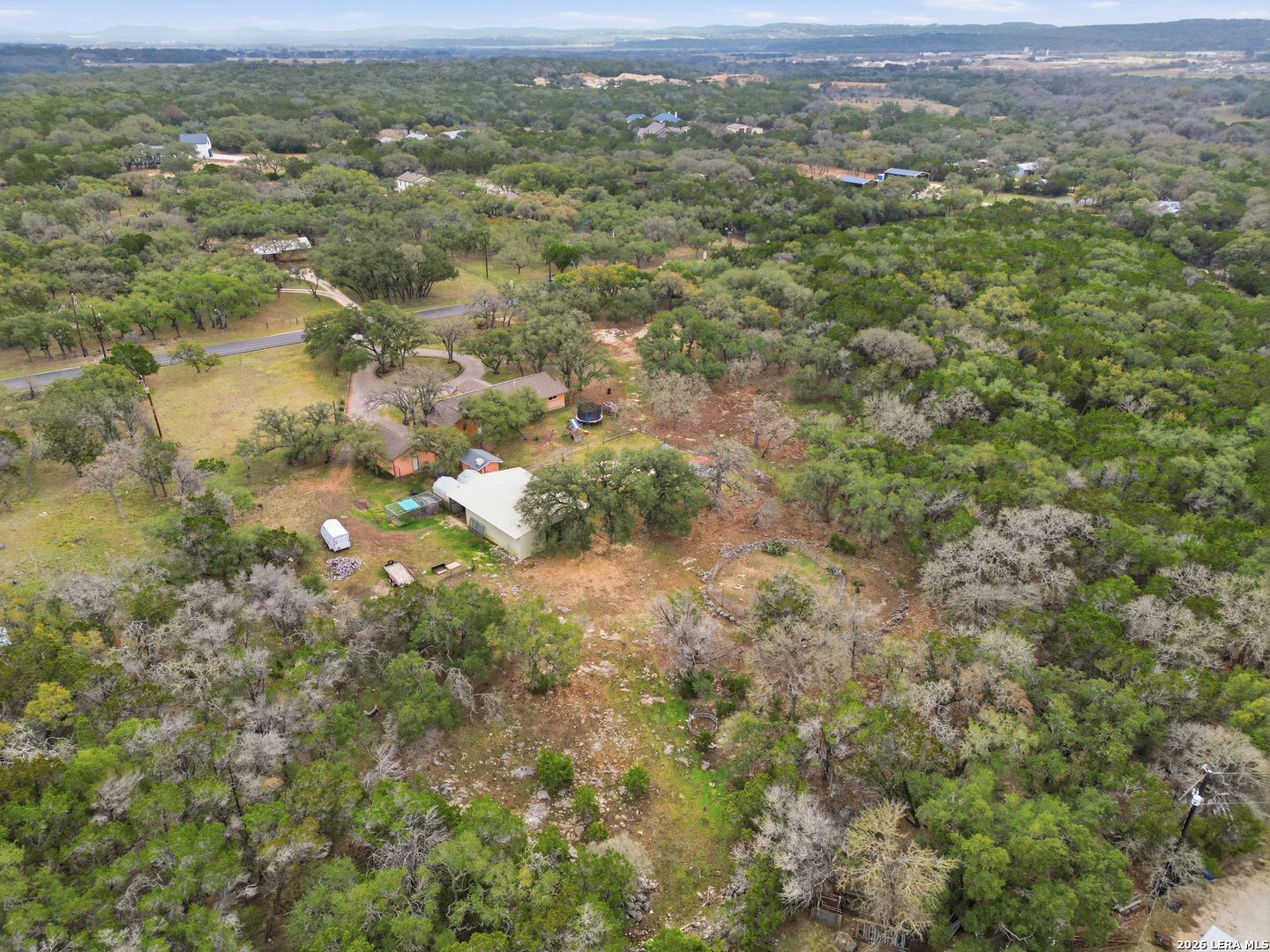 30511 Oakview Road Bulverde, TX 78163 - Photo 35 of 35 an aerial view of residential houses with outdoor space and trees