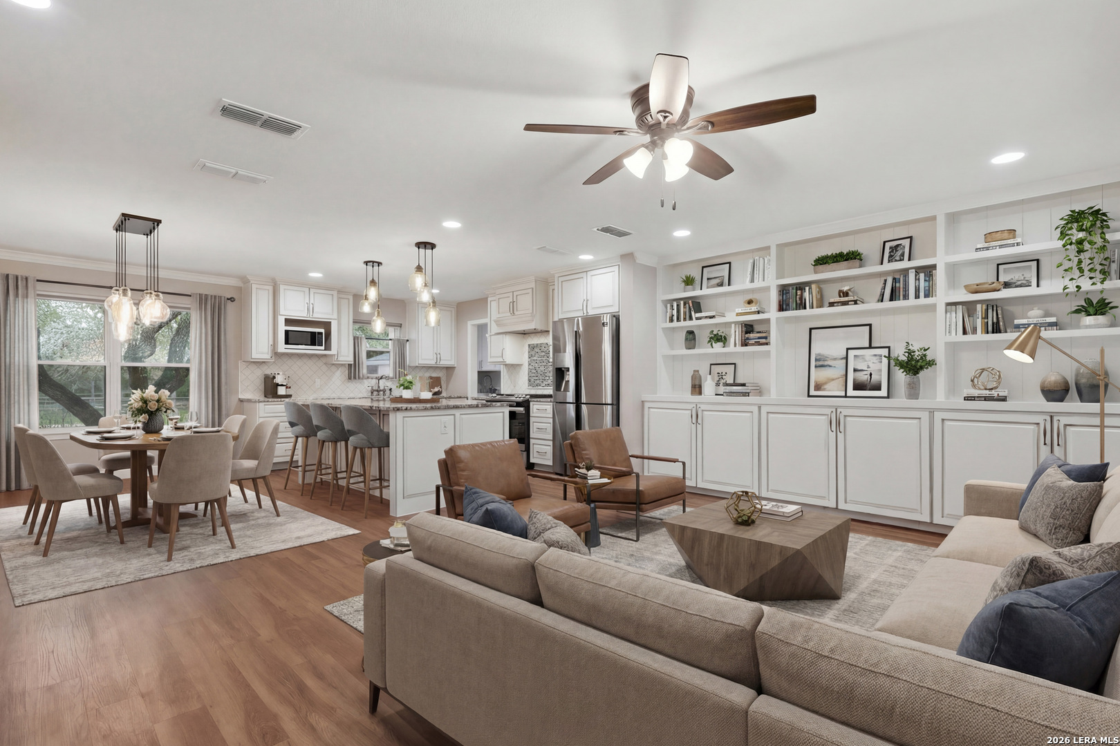 30511 Oakview Road Bulverde, TX 78163 - Photo 4 of 35 a living room with furniture kitchen view and a chandelier