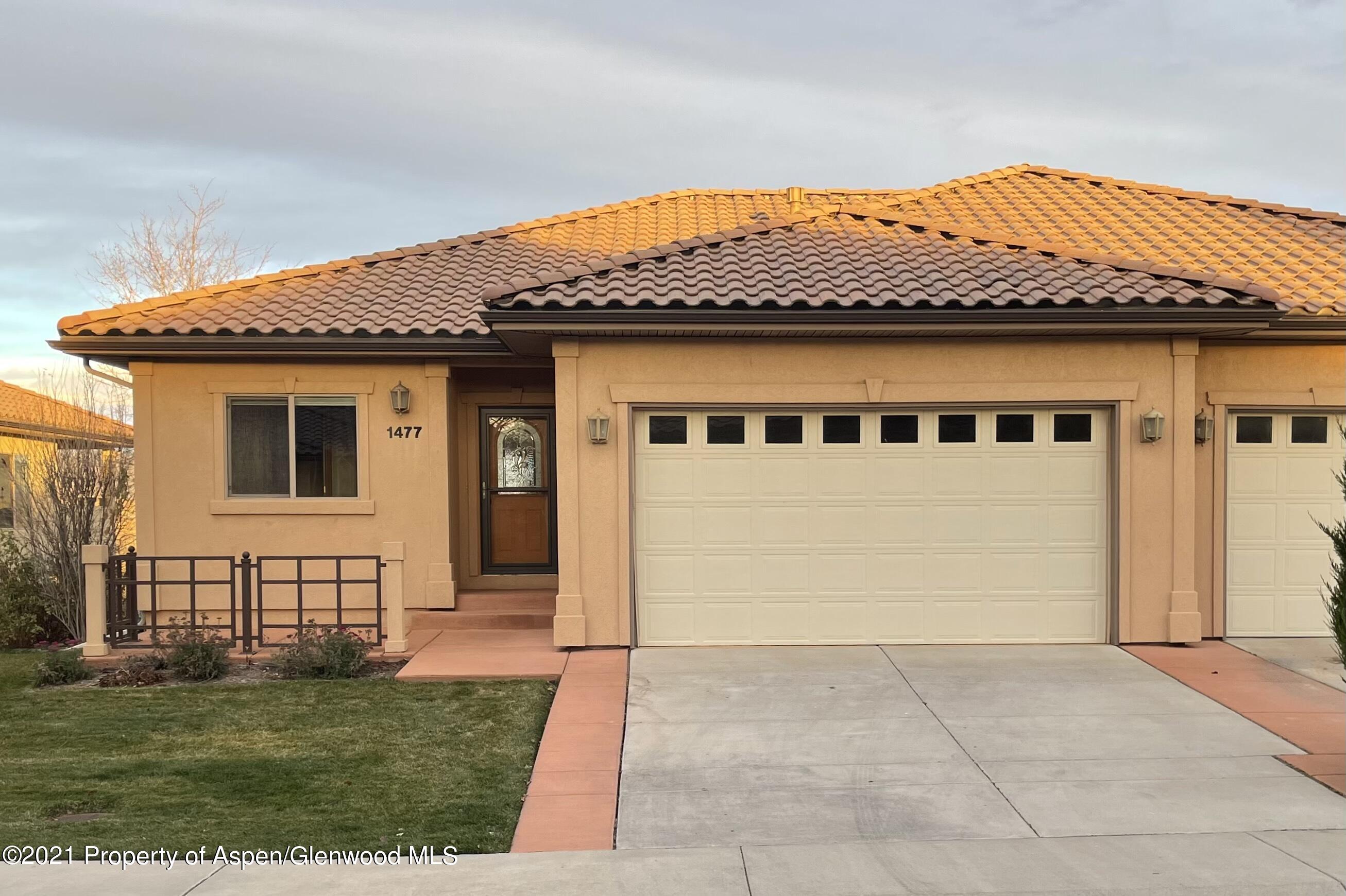 1477 Fir Court Rifle, CO 81650 - Photo 1 of 1 a front view of a house with a yard