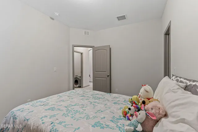 an aerial view of a red and white house