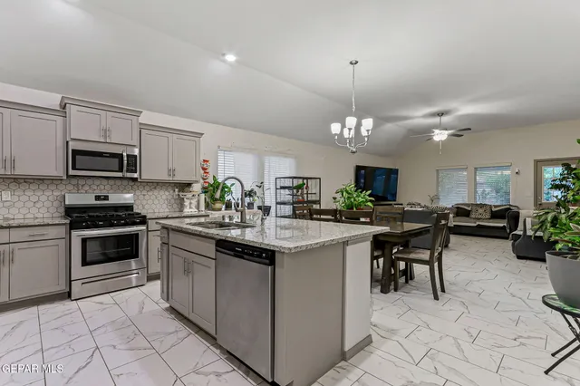 a view of a workspace with furniture
