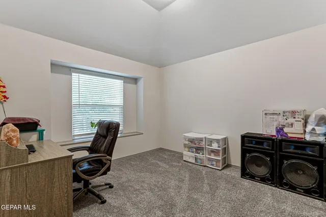 a kitchen with stainless steel appliances granite countertop a sink and refrigerator