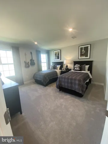 a bathroom with a granite countertop sink a toilet and bathtub