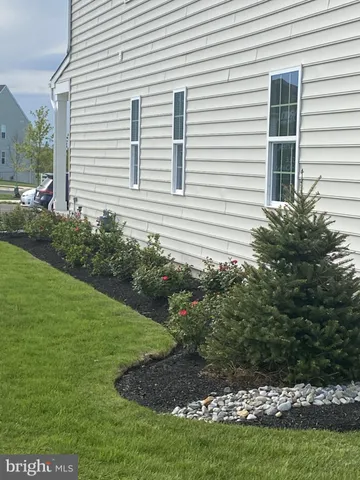 a view of staircase with white walls