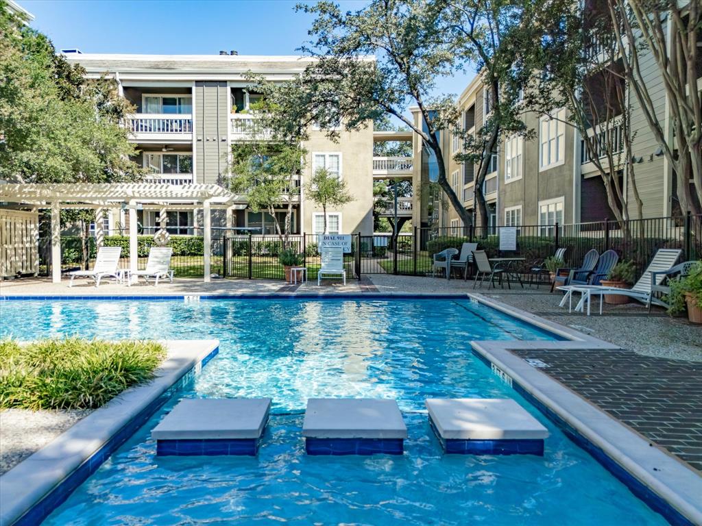 5310 Keller Springs Road, Unit 332 Dallas, TX 75248 - Photo 33 of 39 Community pool featuring a pergola and a patio