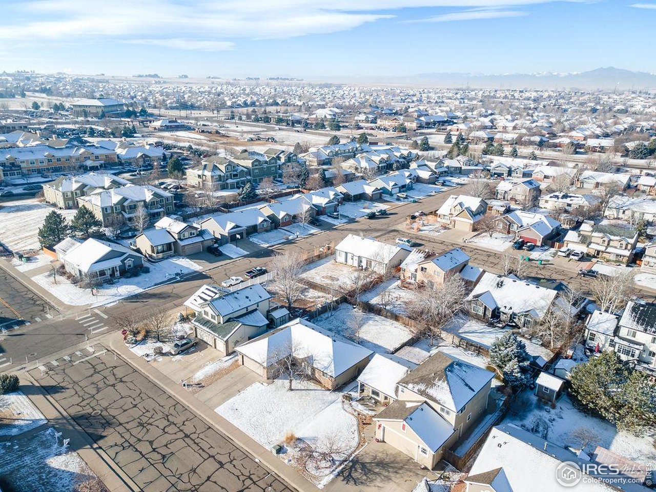 1743 68th Avenue Greeley, CO 80634 - Photo 28 of 30 an aerial view of a city with lots of residential buildings