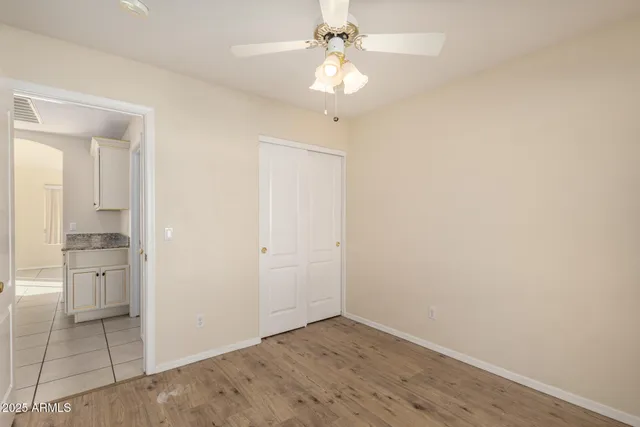 an empty room with a bathroom