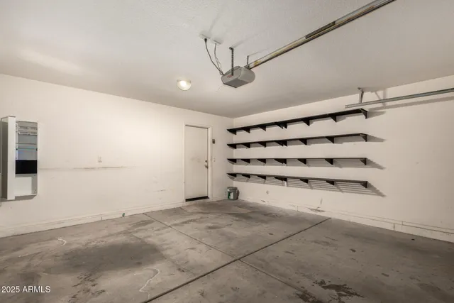 a view of an empty room with a windows