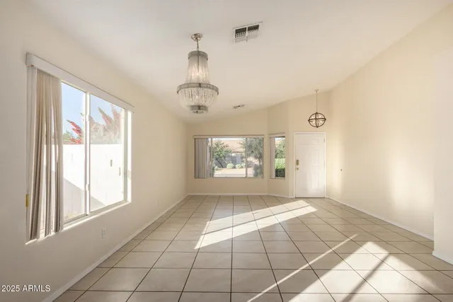 a view of an empty room and window