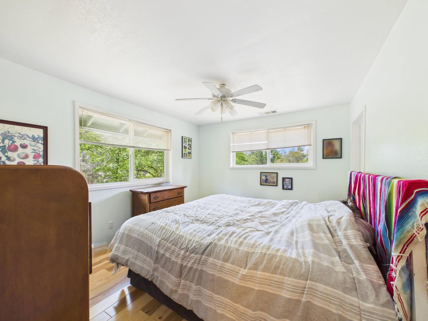 37777 China Creek Road Oakhurst, CA 93644 - Photo 30 of 64 a bedroom with a bed and a window