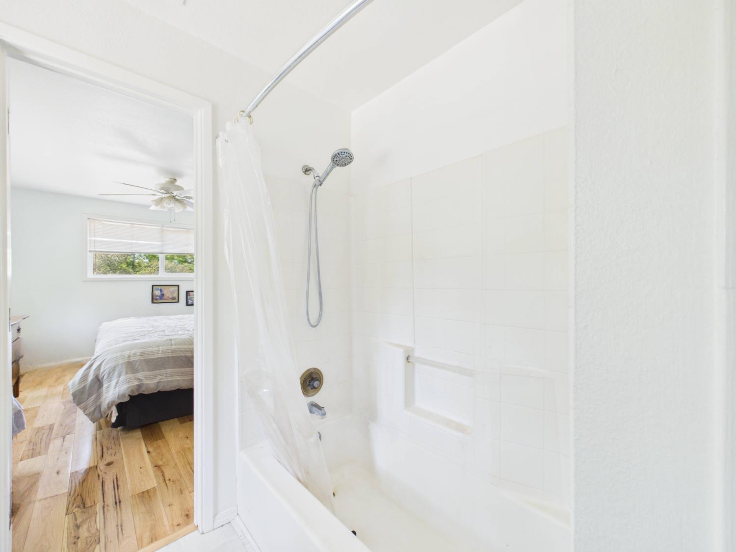 37777 China Creek Road Oakhurst, CA 93644 - Photo 34 of 64 a en suite bathroom with a sink and a tub