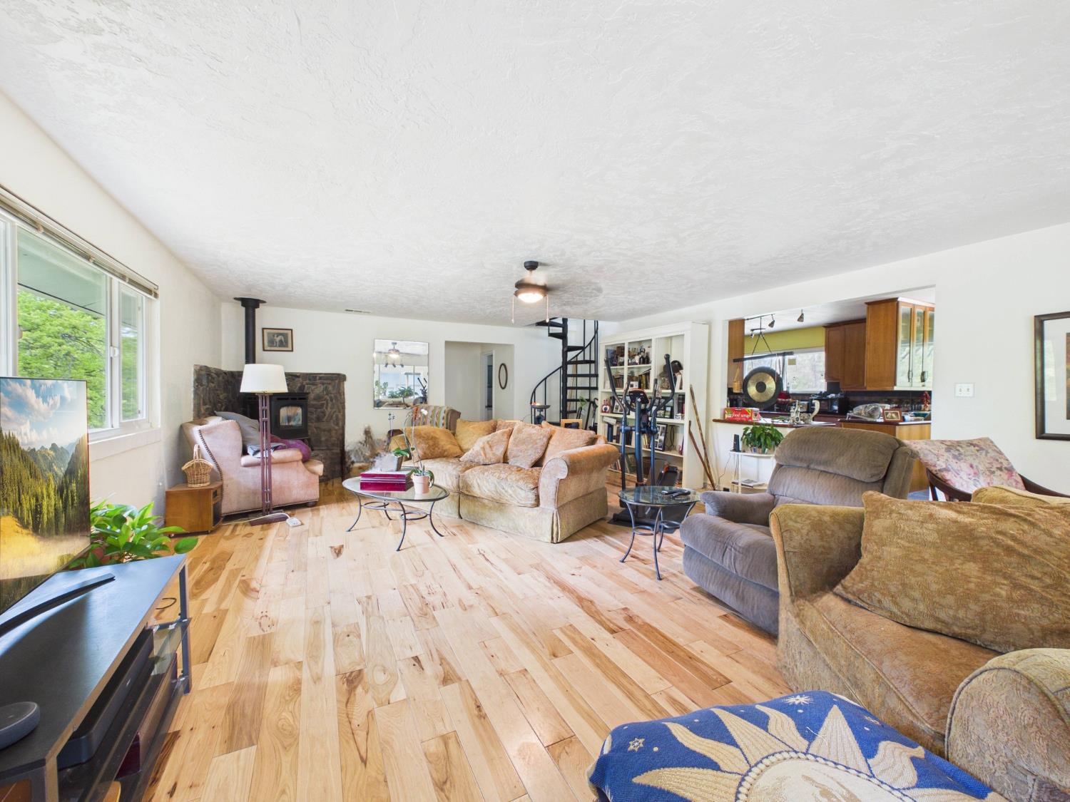 37777 China Creek Road Oakhurst, CA 93644 - Photo 10 of 64 a living room with furniture and a flat screen tv