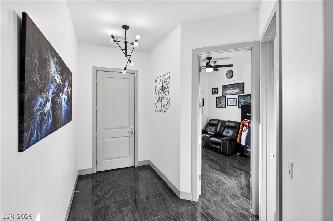 1460 Blue Ridge Trail Mesquite, NV 89027 - Photo 12 of 39 Clean lines and tiled floors define this inviting entryway.