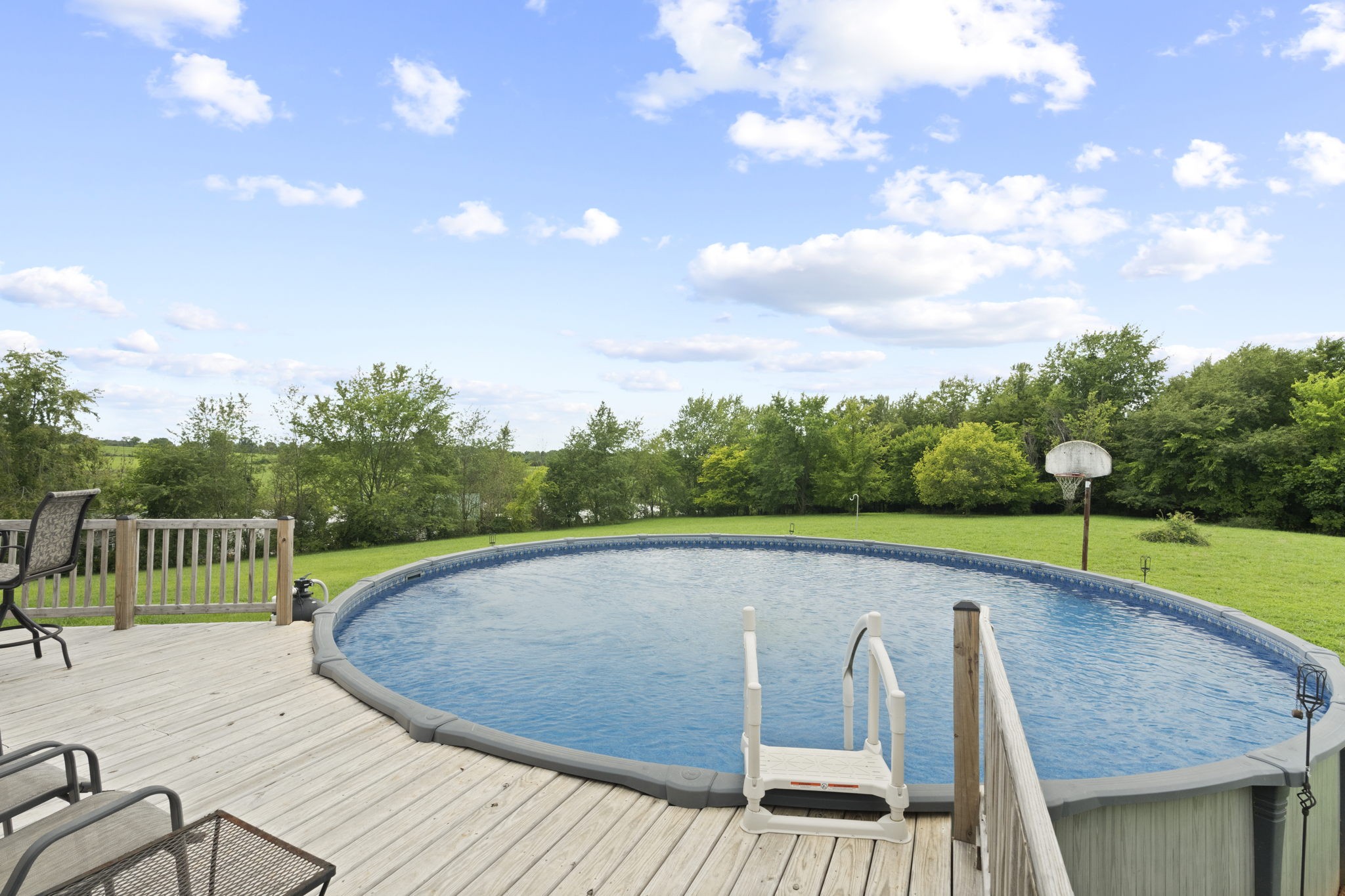 5356 Minnis Road Springfield, TN 37172 - Photo 54 of 56 a view of a swimming pool with a patio and a yard