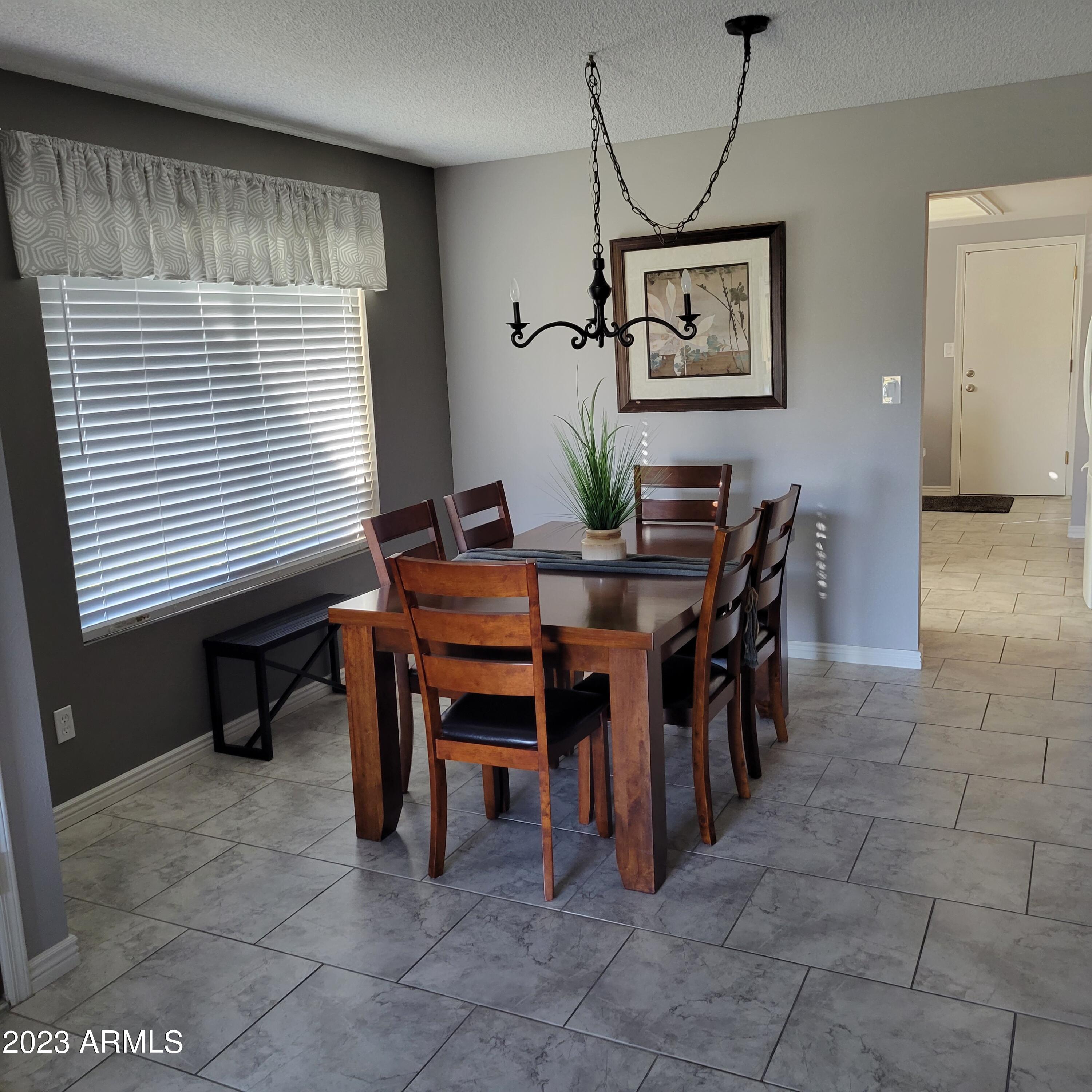 729 South Arrowwood Way Mesa, AZ 85208 - Photo 12 of 38 dining room table