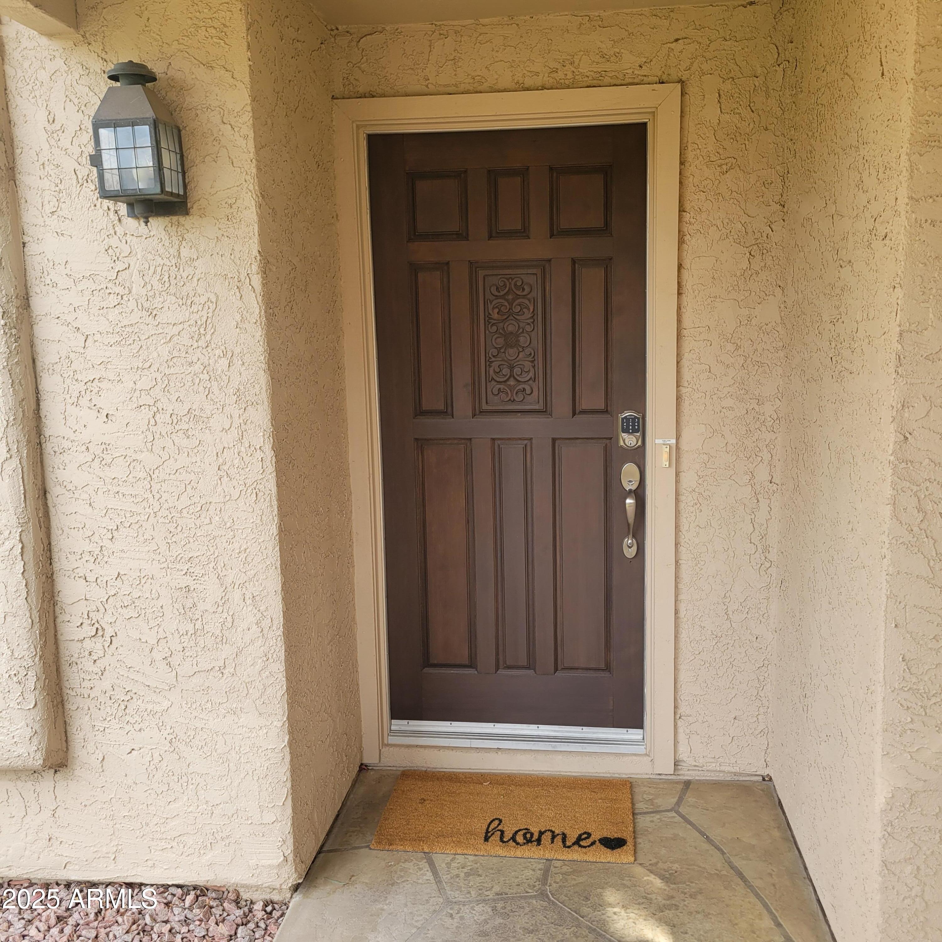 729 South Arrowwood Way Mesa, AZ 85208 - Photo 36 of 38 729 front door 03-25