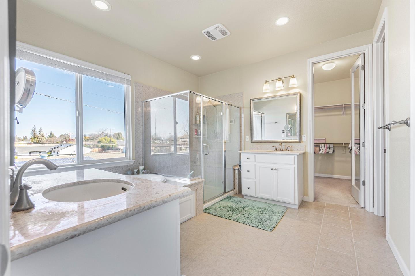 1875 Worthington Circle Santa Clara, CA 95050 - Photo 17 of 39 a bathroom with a sink double vanity shower and a bathtub