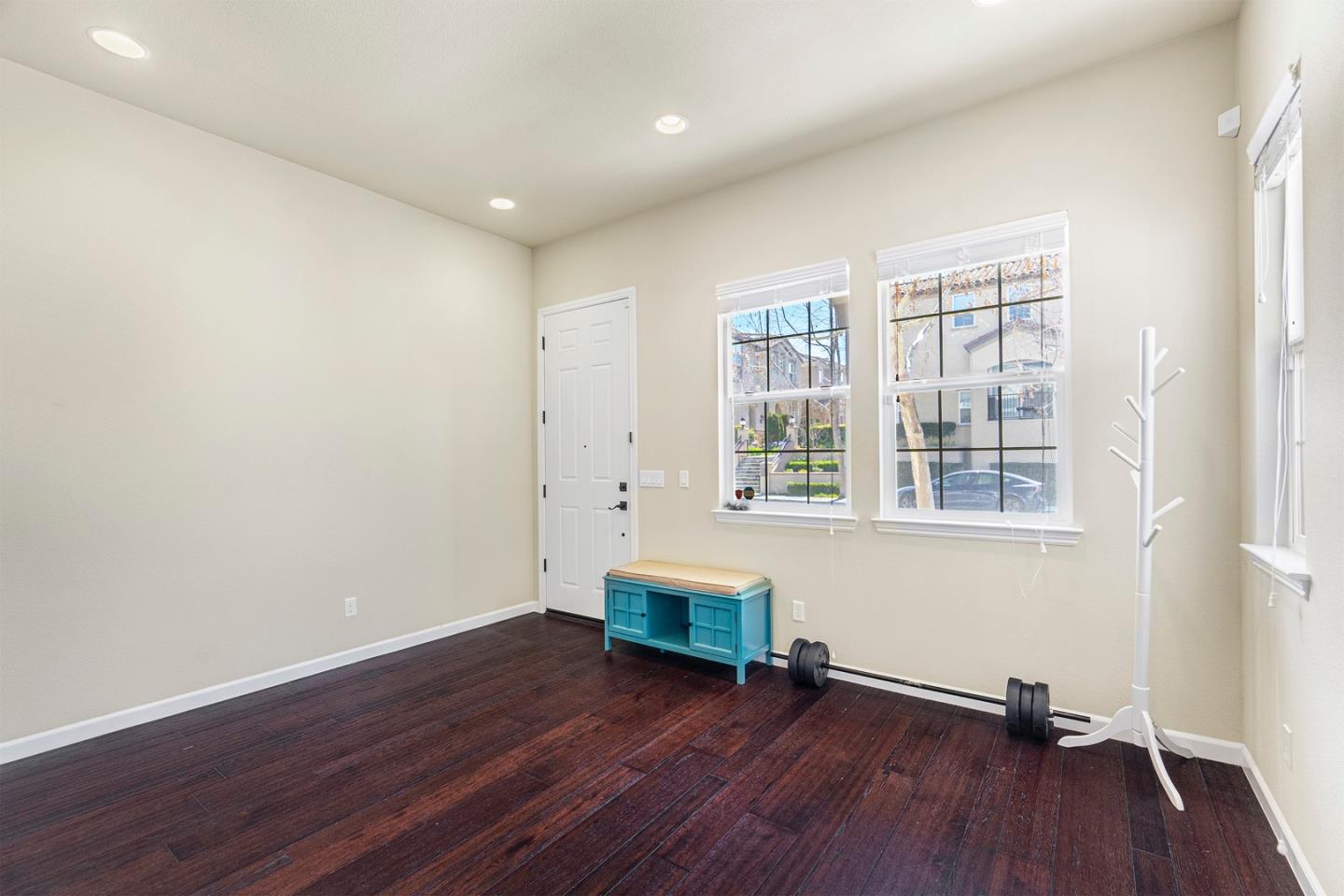 1875 Worthington Circle Santa Clara, CA 95050 - Photo 32 of 39 an empty room with wooden floor and windows