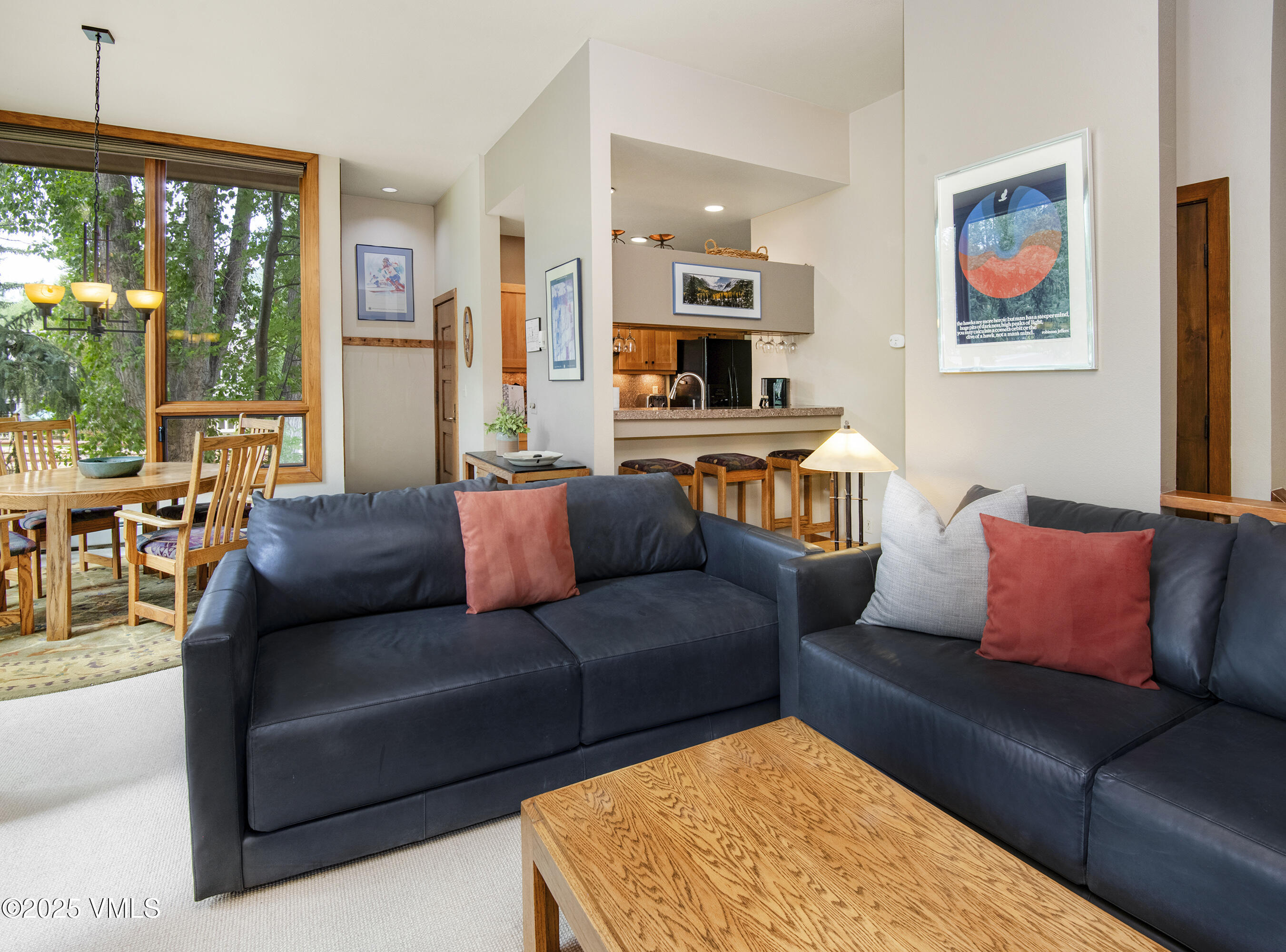 1360 Westhaven Drive, Unit 5A Vail, CO 81657 - Photo 11 of 60 a living room with furniture and a large window