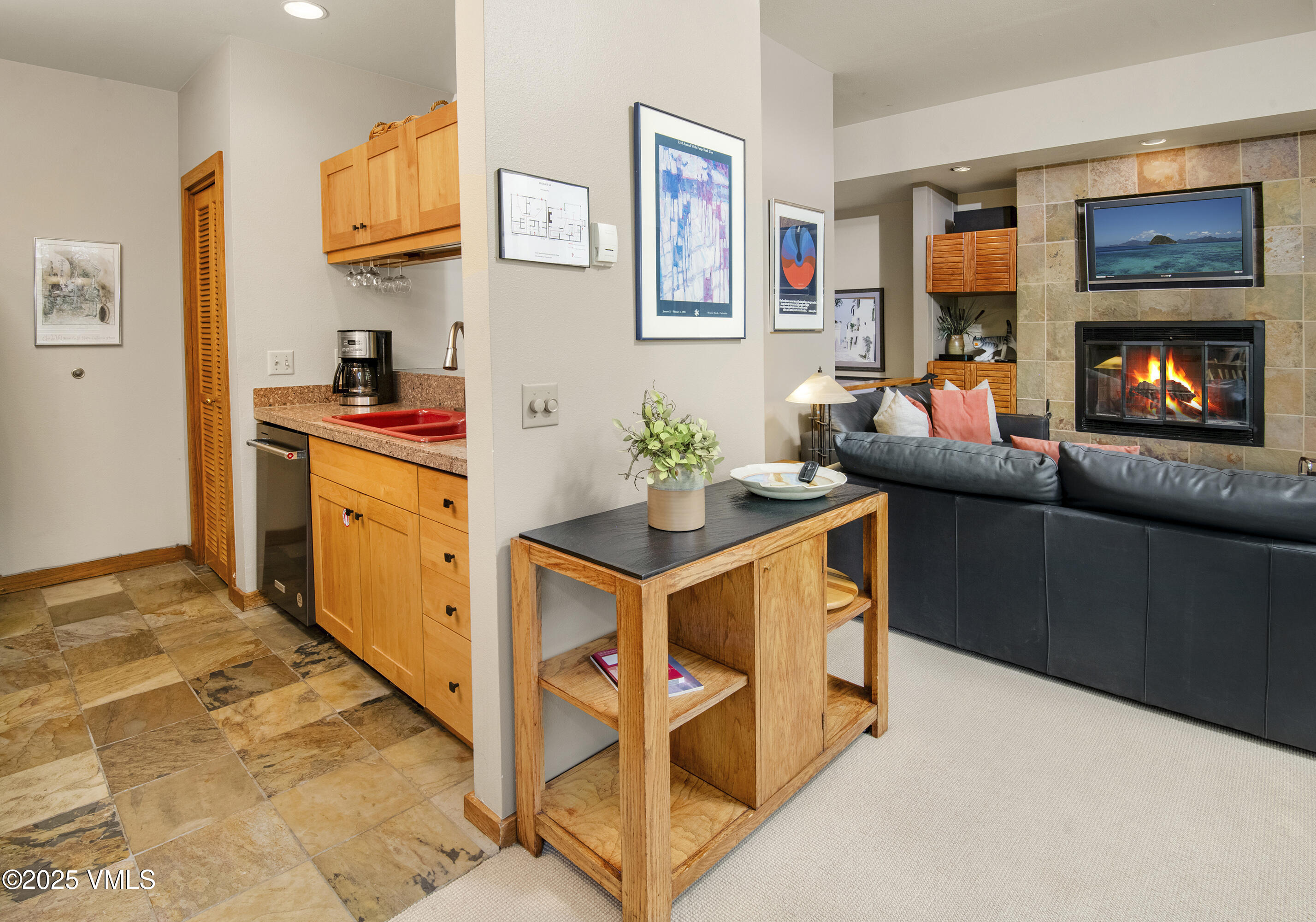 1360 Westhaven Drive, Unit 5A Vail, CO 81657 - Photo 13 of 60 a kitchen with stainless steel appliances granite countertop a stove and a refrigerator