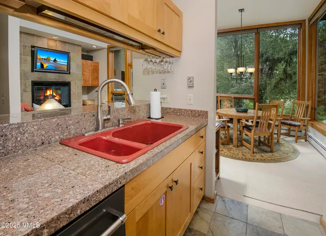 a kitchen with a stove and a sink