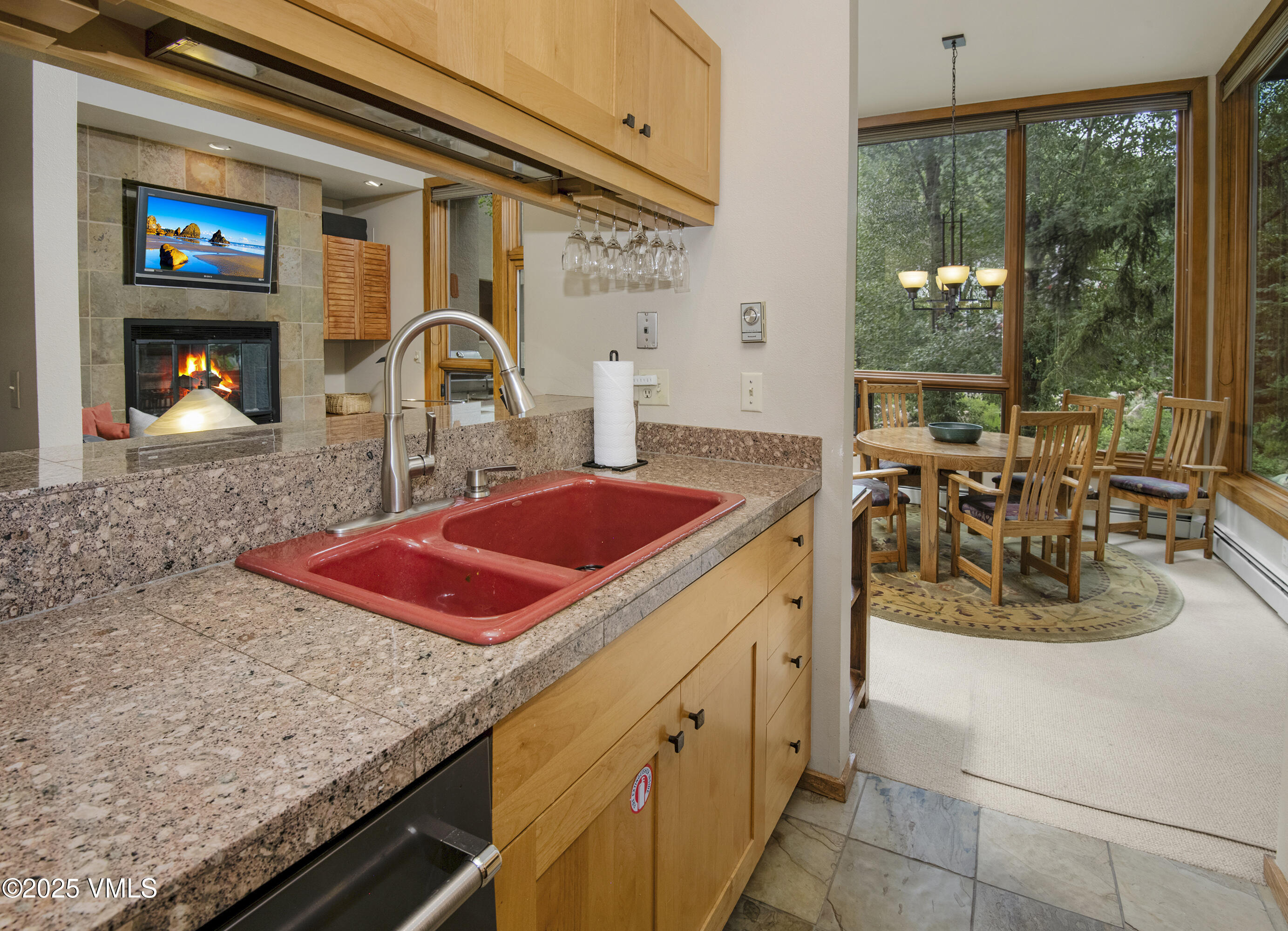 1360 Westhaven Drive, Unit 5A Vail, CO 81657 - Photo 16 of 60 a view of a kitchen with a sink and cabinets